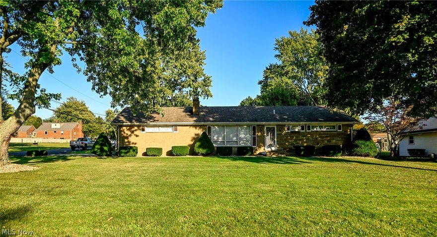 Welcome to 6260 Hollydale Ave. spectacular location on a corner lot. Well maintain home, beautiful brick/stone ranch home and one city black from the Glenoak walking track. The home offers loads of potential with an oversized cement driveway The cover back porch is ideal for beautiful nights or morning coffee. The 3 bedrooms hardwood floors, with 1 full bath and half bath. The property sits on .5 acre you will appreciate the fantastic location peaceful neighborhood and very close to stores and restaurants.