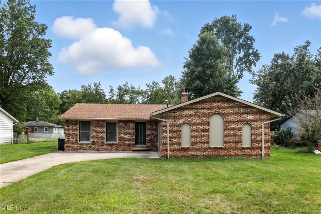 Welcome to this inviting 3-bedroom, 1.5-bath ranch located in a peaceful Brunswick neighborhood. The home features a bright living room with vaulted ceilings, offering a spacious and comfortable feel from the moment you walk in. The kitchen is well laid out with ample cabinet space and flows naturally into the dining area, making it easy to enjoy everyday meals or host small gatherings. A set of sliding glass doors leads from the family room to a large backyard perfect for relaxing, playing, or entertaining outdoors. Vinyl windows throughout the home bring in plenty of natural light. The property also includes a newer roof, siding, and central air conditioning, providing peace of mind for the next owner. All appliances will remain with the home, adding convenience to this move-in-ready opportunity. Whether you're looking for your first home or your forever home, this ranch offers comfort, functionality, and a generous outdoor space all in a great location. Don't miss your chance to make it yours. Schedule your showing today.