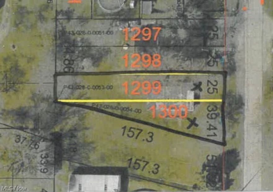 2 city lots with outbuilding. Outbuilding needs TLC. Selling As Is, Cash Only.