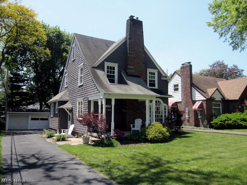 This is truly a must see home with all the style and flair you could ever hope for plus it's in one of the most desired locations in Cuyahoga Falls. Beautifully stained expresso hardwood floors including kitchen. Both baths are completely remodeled. Large open kitchen features granite counters and stainless appliances. Formal dining room is large and living room received a completely remodeled woodburning fireplace with special lighting. Wired for sound and hardware for mantle mounted TV. Most windows replaced except for two gorgeous architectural windows. Huge master has fireplace feature. Partially finished basement has room galore plus a high efficiency furnace and central air! Outside is a completely fenced (wood privacy) and Seller just added a beautiful large deck with cutting edge horizontal wire rail inserts. Enjoy all Cuyahoga Falls Parks and amenities including savings on utilities.