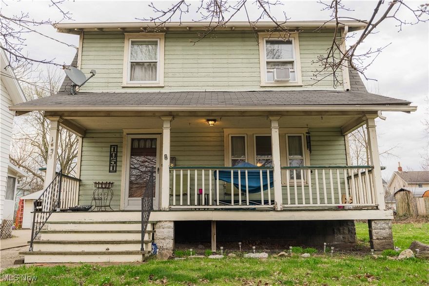 Calling all investors! Must see home with beautiful hard wood floors throughout. Big front porch to sit outside in the warm summer nights coming soon. The home offers a dining room just off the kitchen and a large living room with a fireplace. There are 3 bedrooms and one full bath (bathtub and separate walk in shower) on the second floor. Full basement for plenty of storage and laundry. One car detached garage. Nice quiet backyard. Minutes from The University of Akron, downtown Akron and other amenities. Do not miss out on this fantastic investment property. Schedule your private showing today.