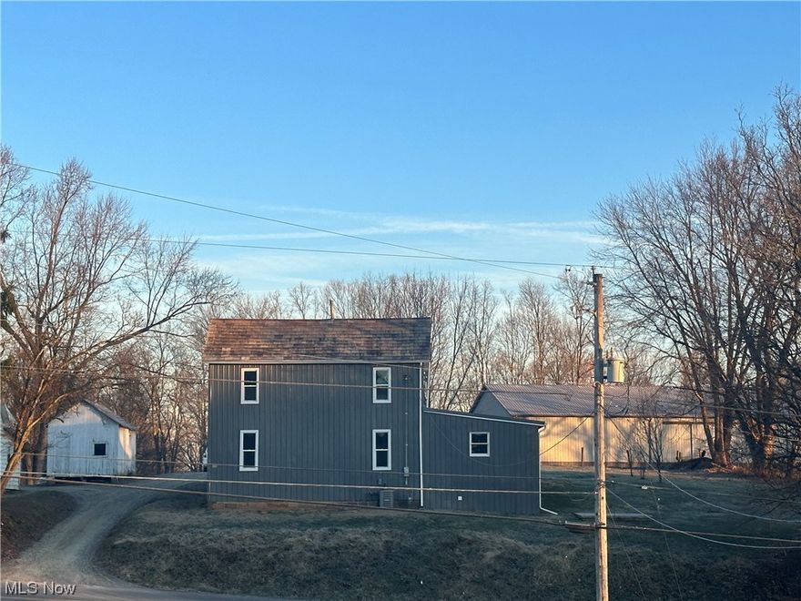 Nestled just outside the city limits on a half-acre, this newly remodeled 4-bed, 2-bath home awaits its lucky new owners. A modern marvel in the popular barndominium style, this residence seamlessly blends rustic charm with contemporary living.Step into generously sized rooms offering ample space for both relaxation and entertainment. Experience the height of comfort with oversized bathrooms that feel more like personal spas. Tasteful finishes and top-notch fixtures create an atmosphere of indulgence.The heart of the home is undoubtedly the expansive kitchen. Lots of space for cooking, entertainment, and the perfect gathering place for the family to meet up for dining.A new metal roof, and a repaired slate section, not to mention a new bedroom with a new second bathroom featuring convenient in-house laundry, make this home not just renovated, but revitalized.Enjoy worry-free living with new plumbing, doors, and windows and light fixtures throughout. Stay comfortable year-round with a new hot water tank and central AC. The upgraded electric panel and electric entrance ensure the home is future proofed.Benefit from a new water service from the meter to the house, ensuring efficiency and convenience for your daily needs.This is not just a home; it's an opportunity. Priced competitively for a quick sale, this gem won't stay on the market for long. This remodeled haven promises the perfect blend of rural tranquility and modern luxury. Don't miss out on the chance to make this newly remodeled property your own. Schedule your own private viewing today.