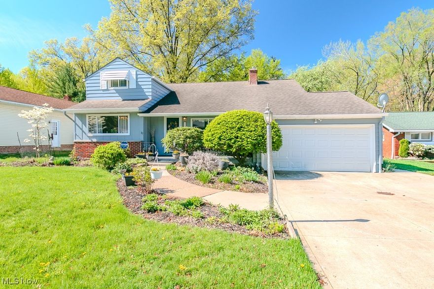 Welcome to this spacious split- level home situated in the serene Indian Hills Estates neighborhood. Built in 1956, this residence offers 4 bedrooms, 2.5 bathrooms, and approximately 2,441 square feet of living space on a generous .55 acre lot The property boats great curb appeal and features a park - like back yard and extending over 300 feet door, providing a secluded and tranquil setting. The lower includes a walk out patio, perfect for enjoying the expansive outdoor space. Additional amenities include two car garage and a basement with walk out access.