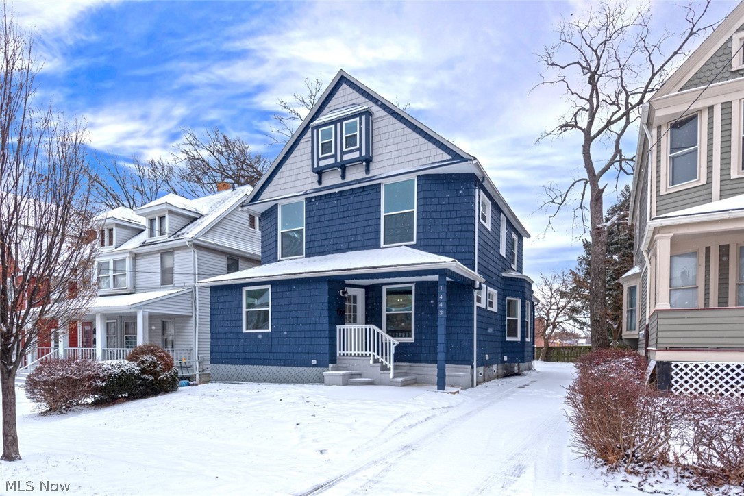 Welcome home to this beautifully renovated colonial in Lakewood! This delightful home is updated with everything you need to call it home- all that is missing is you! As you step inside, you will immediately appreciate the open floorplan and gorgeous hardwood floors that flow throughout the first floor. The spacious living room provides plenty of space for relaxing and entertaining. The dining area opens to the stunning kitchen, which features dazzling quartz countertops, sleek white cabinetry, and a full complement of stainless steel appliances. A half bath rounds off the first floor. The second floor master bedroom features a lovely en-suite bath, complete with a quartz countertop vanity and a step-in shower. Two large bedrooms and a full bath complete the second floor. The spacious third floor is perfect for a fourth bedroom, office or media room. The partially finished lower level includes a family room with a fireplace, an office or sitting area, a convenient laundry area with was