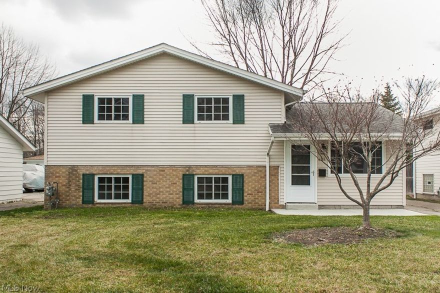 Beautifully Remodeled from top to bottom, inside and out! This 2000+ sq.ft home has everything done for you to move right in and enjoy! The spacious and vaulted living room opens to the sprawling eat-in kitchen that boasts all new stainless appliances, new sink, garbage disposal, high end granite & soft close cabinetry. The finished lower level is ideal for an extra living space or private master suite with a walk in closet; plus a new full bathroom & laundry room additions. 3 generously sized bedrooms on the 2nd level with updated full bathroom & the attic is finished for an extra 5th bedroom option. All new floors including top of the line tile, lighting, nickel hardware, interior & exterior doors, baseboards, trim and casing throughout. Plumbing, electrical, indoor and outdoor gas lines all updated!   New high efficiency hot water tank. The house and the 2 1/2 car garage have newer roofs.  New concrete front and back patios.  Call today so you don't miss out on this amazing must see