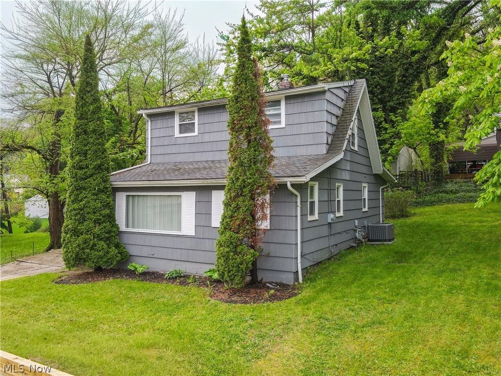 Photo of 2574 South Street, Lakemore, OH 44250 (MLS # 5206904)