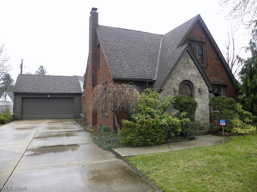 Curb appeal plus! This 3 bedroom 1.5 bath brick cape cod is oozing with character. Gorgeous natural woodwork, wood floors, gas fireplace, breakfast nook, heated enclosed rear porch, 2 car detached garage, fenced rear yard, AC and concrete drive. Extremely well cared for inside and out