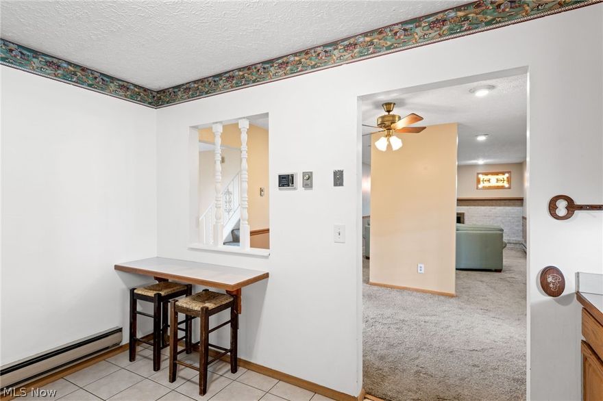 Prepare to be moved by this 3 bedroom, 2 a half bath home situated on a great lot. Inside the home you will be wowed with charm. Enjoy a large eat in kitchen with a separate dining area that flows right into the great room. Get cozy next to the beautiful white brick fireplace. What makes this home even more unique? It has an in-law suite! The in-law suite is equipped with a full kitchen, gas fire place, and full bath.  Moving upstairs you have 3 generously sized bedrooms and a full bath. Enjoy your coffee in the 3 seasons room while the kids play in the fully fenced in back yard! This is a must see, schedule your appointment today!