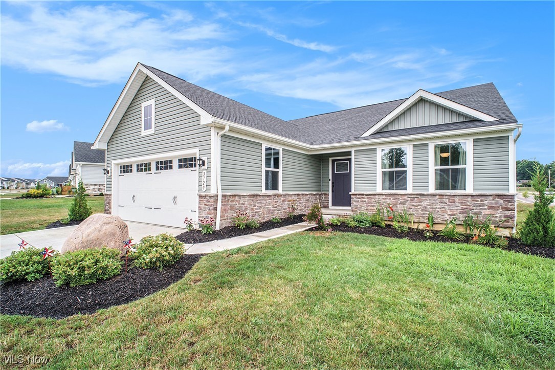 Welcome to modern comfort and easy living in this thoughtfully designed, low maintenance ranch-style home in Norton! Completed in 2023, this move in ready property features 3 bedrooms and 2 full baths. The bright, open layout features a contemporary kitchen with quartz countertops, stainless appliances, custom Downing Duraform espresso cabinets and a large center island that flows into the dining and living areas. High-end upgrades include luxury vinyl flooring and modern finishes adding both function and flair. Step outside to a covered deck with recessed lighting ideal for relaxing or entertaining. The primary suite offers a private retreat with a large walk-in closet and master bath with dual sinks, marble countertops and a beautiful custom tiled walk-in shower. First floor laundry. Enormous unfinished basement with a rough in for future bath and walk out slider. Great location on no outlet street. With HOA covered landscaping and snowplowing, this home offers year round peace of mind. Don’t let this one slip away!”