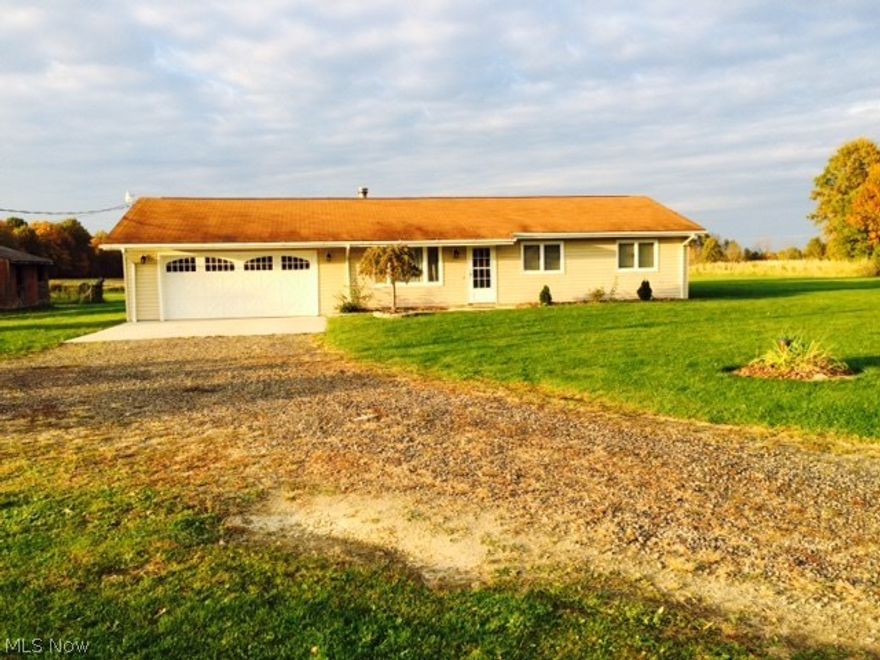 Bring the family and livestock too. 3 bedroom, 1-1/2 bath Ranch with 1-1/2 story 4 stall barn on 2.5 acres. The fully applianced eat in kitchen has French doors that lead to a 18 x 12 deck. The living room features a wood burning stove. All bedrooms have new floor covering. Master bedroom features a 1/2 bath. This home has many updates including new siding, fascia, soffit, all new appliances in 2013, new 200 amp panel box and breakers, new service wire and meter box. Both bathrooms were updated in 2013. Freshly painted interior and ready to move into. Home also comes with a 2-10 Home Warranty.