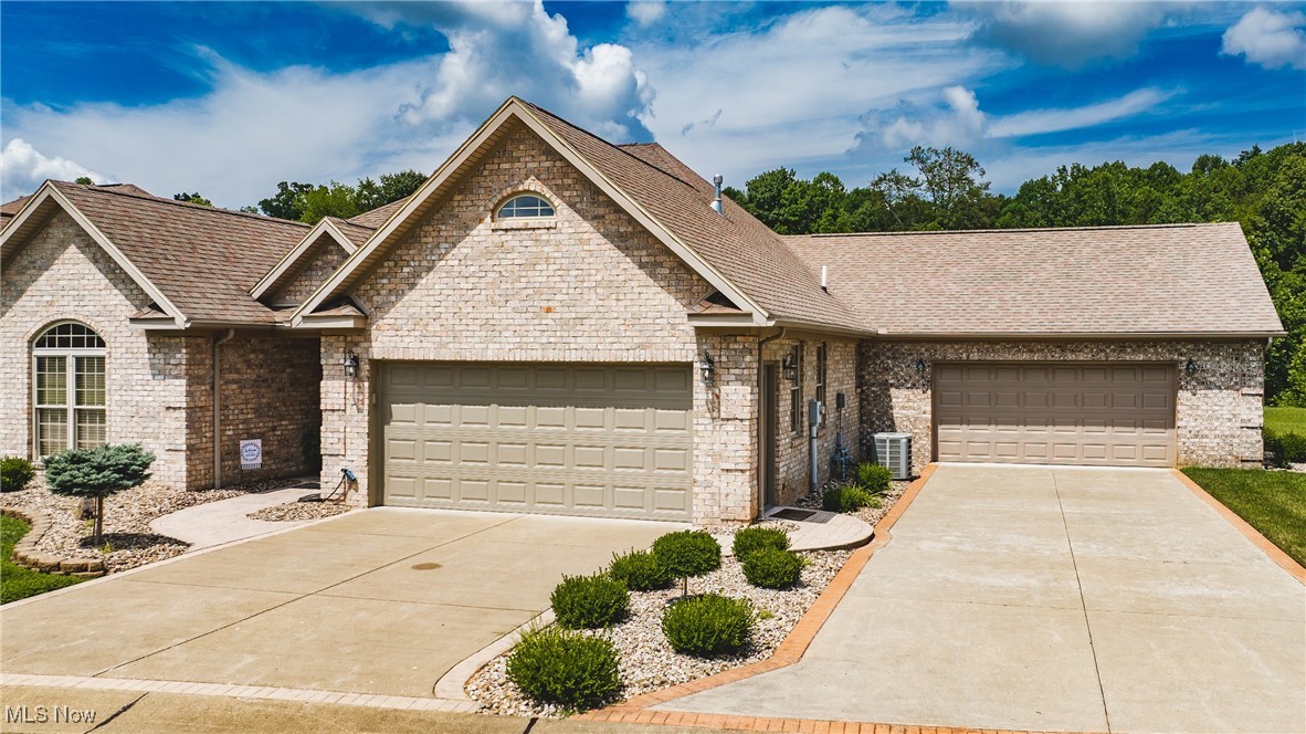 Located in the highly desirable Wyndemere community, this all-brick patio home offers luxurious one-floor living in immaculate, like-new condition. Beautifully landscaped and meticulously maintained, this residence blends timeless style with modern updates in a quiet, established neighborhood close to schools, shopping, and dining.
The spacious great room features gleaming hardwood floors and flows effortlessly into the dining area and kitchen, all enhanced by soaring 9- and 12-foot ceilings. The kitchen is a standout with granite countertops, stainless steel appliances, and a tiled backsplash. Every room has been freshly painted and updated with newer interior and exterior lighting fixtures, showcasing the home’s thoughtful design and elegant décor.
The owner’s suite includes a walk-in closet and a tiled walk-in shower. Additional amenities include a central vacuum system, and a lawn sprinkler system in the front yard.
Enjoy quiet mornings or evening gatherings on the private back porch and patio, where you’ll often be greeted by daily visits from turkeys and deer. Two double-stall brick garages, with the end unit offering a drive-through feature for added convenience. Two additional lots have been added, providing extra space, privacy, or future possibilities.
This is patio-style living at its finest in one of Parkersburg’s most prestigious communities.
