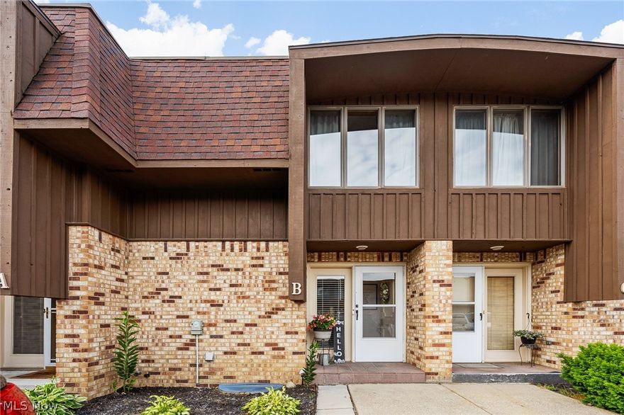 Welcome to maintenance-free living in this well-maintained and updated 2BD/1.5BA condo. Newer luxury vinyl plank flooring has been installed throughout the half bath, hall, kitchen, living and dining rooms on the main level (2020) and full bath on the upper level (2021). The home boasts a kitchen with updated cabinets, a newer range and lighting; newer bathroom vanities; and freshly painted interior with neutral colors (2019). Finished recreation room on lower level has newer carpet (2020) and provides the perfect place to relax or entertain. The private fenced patio is a peaceful retreat to enjoy the outdoors. A designated carport space and additional reserved spot is provided with the unit, and guest parking is located directly outside the unit. Additional updates include rewired electrical panel and sump pump backup battery (2019); Roof (2018); Hot water heater (2015); and HVAC (2010). Also included is Nest thermostat, security system, and video doorbell. Conveniently located to sho