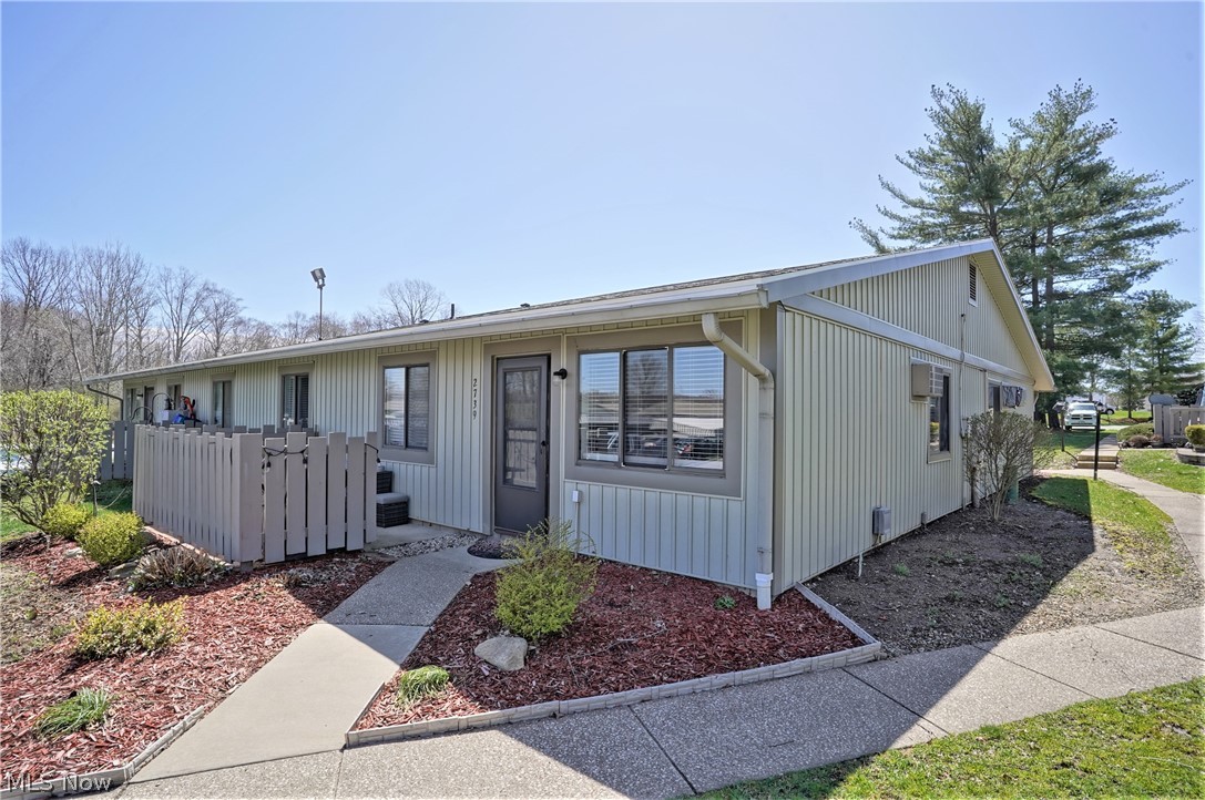 Enjoy total First Floor Living, including spacious 1st Floor Laundry room with Tub, in this End Unit in the very well maintained Copley Village Condominium, conveniently located minutes from mega shopping in West Akron and convenient to Highways. This Condo is only a short walk to the association Pool! Seller has done a complete renovation of the property since taking possession in 2021. This includes all new Gorgeous laminate Flooring everywhere except Bedrooms, Brand New Kitchen Cabinetry, Sink , Stone Backsplash, Faucet, Disposal, new appliances, lighting, plus Granite Countertops. A Coffee Bar Feature was also added in Kitchen. Additionally, everything was professionally repainted in fashion neutrals. The Bathroom features new ship lap board on walls, Vanity, Sink Light Fixture, New Toilet and there is a Jetted Tub. Roof was replaced in 2021. This unit has a beautiful patio with privacy fence and the landscaping is always well maintained and beautiful. With a low monthly maintenan
