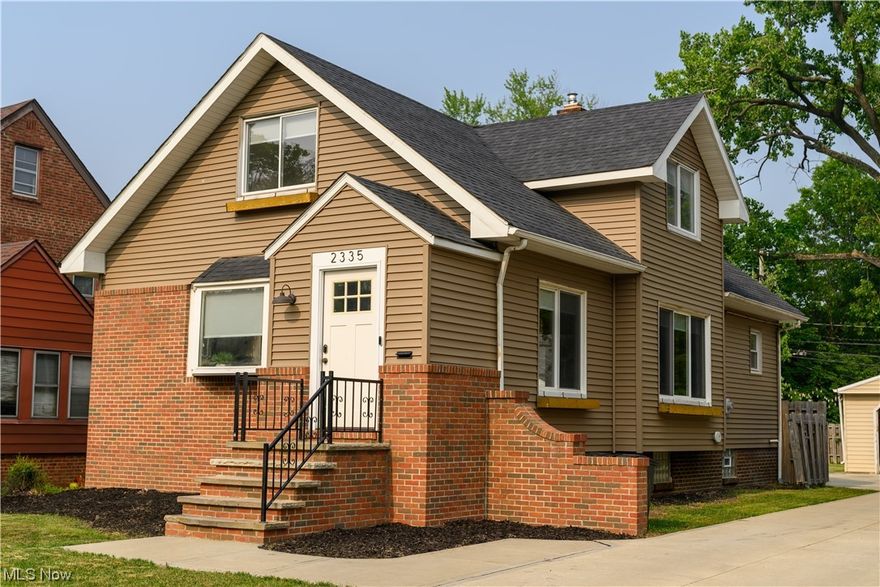 Welcome home to this charming open concept Cape Cod. The home was COMPLETELY renovated in 2019! Enter the front foyer which leads into the open living and dining areas, a beautiful kitchen with slow close cabinets, and pull out shelves! Butcher block counter tops, SS appliances, a custom made breakfast bar w/ seating for 4. First floor bedroom with walk-in closet and xl bathroom w/ double sink vanity and laundry area. The second floor includes 3 bedrooms,  custom built shelving in the second floor hallway, large bathroom w/ double sink vanity. Painted wood floors in 2 bedrooms and hallway. 3 bedroom is carpeted. The basement was completely renovated in 2019 w/ brick walls, a poured concrete floor and a sump pump. All appliances 2019, roof 2018, exterior siding and concrete driveway and patio 2019. The backyard is totally fenced in w/ a gated driveway  (2020) and a 2 car garage. Enjoy a concrete patio with exterior lighting - and a huge backyard lawn - perfect for entertaining. The 2019