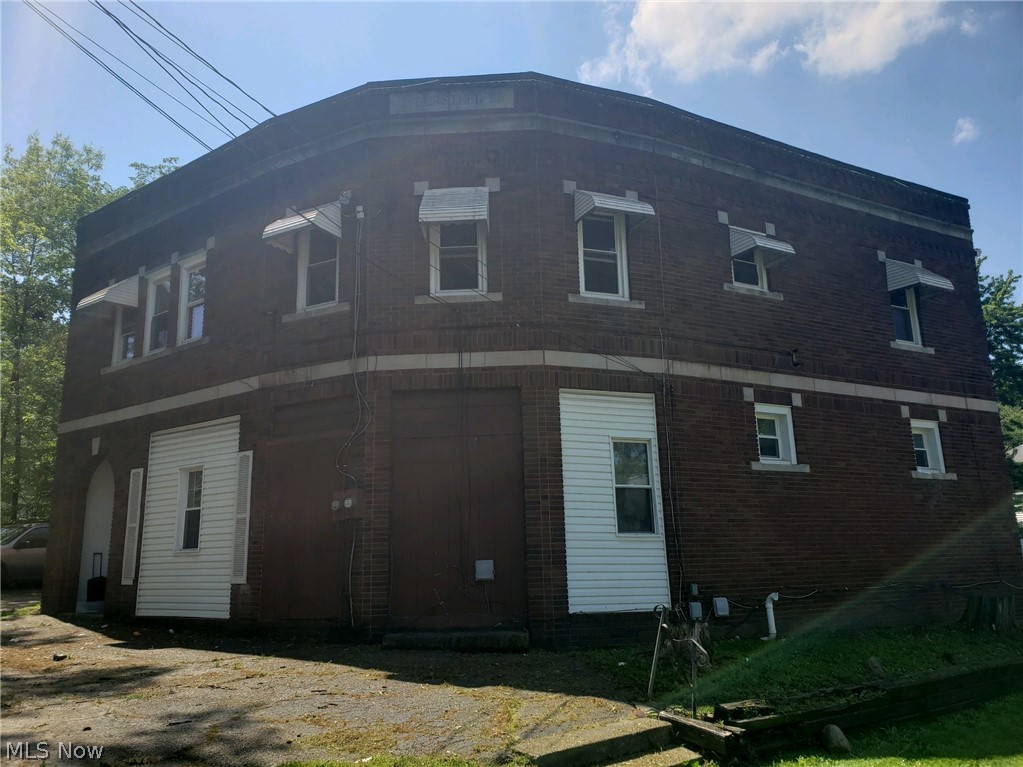 Three bedroom brick unit with good rental income. Entire top floor is a three bedroom unit with kitchen, dining room, and living room. Two one bedroom units on main floor. All units have a separate entrance. The basement is unfinished but is a walk out and also has entrance from front door. Owner pays all utilities. Off street parking. When fully occupied rental income is 2000 a month.