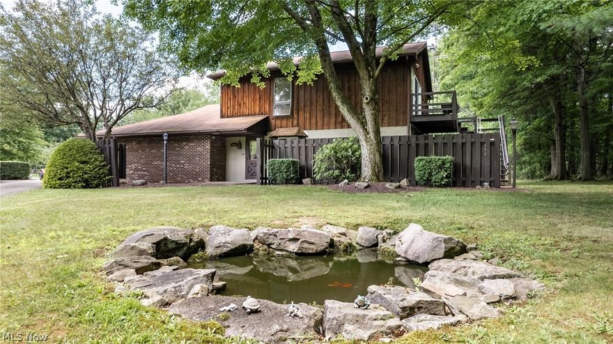 This is the one you have been waiting for!!! Situated on a generous .86-acre lot directly adjacent to Mosquito Lake State Park this stunning three bedroom two-bath bi-level home offers unparalleled access to nature & other outdoor activities.  This property features a three-car heated attached garage as well as a four-car heated detached garage for the hobbyist or for extra storage. Inside the home boasts vaulted ceilings in the great room & sliding doors leading to a deck with a picturesque wooded view & a charming goldfish pond  The eat-in kitchen provides a cozy space for family meals.   The lower level provides a family room, a full bath,  2 bedrooms,  & a separate laundry area.  You will also find a fascinating bonus room with skylight.    Nestled on a corner lot with a classic split rail fence this home offers privacy & rustic appeal.  Don't miss out on this unique opportunity to own a home in such a desirable location. Home is being SOLD AS IS & any septic repairs or replacement will be at the buyers expense.