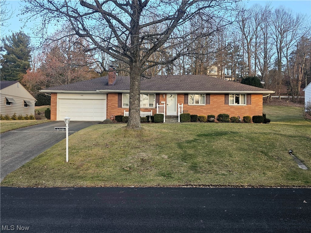 Welcome to 1748 Pareson Avenue! This 3 bedroom, 3 bath, move-in ready brick ranch with a 2 car garage that is nestled in a sought-after neighborhood in Coshocton City School District. This clean and tidy home has been enjoyed by the same owner for over 40 years. The floor plan seamlessly connects the family room (with a gas fireplace!) to the formal dining area, creating an ideal layout for hosting gatherings or enjoying family meals. The well-appointed eat-in kitchen features ample updated cabinetry with a view of the private backyard. The first-floor master suite provides a private ensuite bath. Two additional first floor bedrooms offer comfortable accommodation for family members or guests. The dry, spacious lower level has a full bathroom, laundry area, large storage area with multiple metal storage racking, large recreational area (the pool table stays!) and separate bonus room. The heated 2 car garage has an interior handicap ramp for accessibility into the home. Outside, the meticulously landscaped yard offers plenty of space for outdoor activities and relaxing on the covered back patio. The attached garage provides parking convenience and additional storage options. Recent updates include but are not limited to a new roof in 2018, new central air and furnace in 2019, new faucets, new railings for front porch and back patio, and Bath Fitter installation (with a transferable warranty!). All major kitchen and laundry appliances will convey to the new owner at a successful closing.
Located in a friendly and well-established neighborhood with fantastic neighbors, this home has easy access to nearby parks, schools, shopping, dining, and entertainment options. Don't miss the opportunity to make this charming brick ranch your own. Schedule your showing today and experience all this home has to offer!