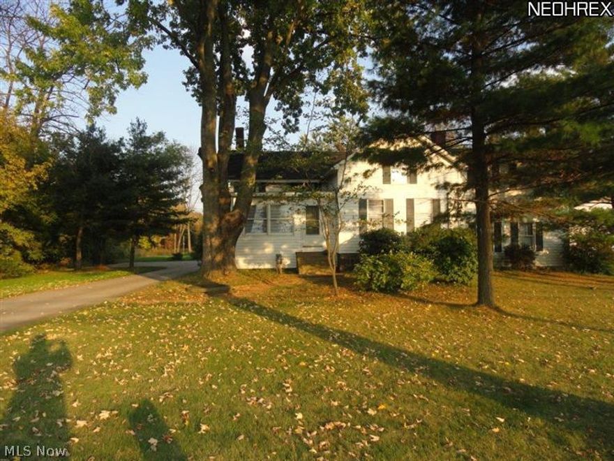 Century Home - 3396 Sq Ft. - 40x40 2 story out building/gazebo. 2 separate wooded parcels that measure 2.5 acres (92x960 and 100x200) Gas well on property is connected to home to help with gas bill. Well is piped to out building but not connected. Home has 5 bedrooms and a first floor office and first floor  laundry. It was once 2 separate suites. so is perfect for an in-law or additional living suite, 2 kitchens. 2 WBFPs. Contractor or car buffs will love the out building that has heat and power. Ample paved parking in addition to 2 car attached garage. Two heating system. FHA & (gas) baseboard (electric). Lots of room to roam in and out! See attached plot of land. A pleasure to show.