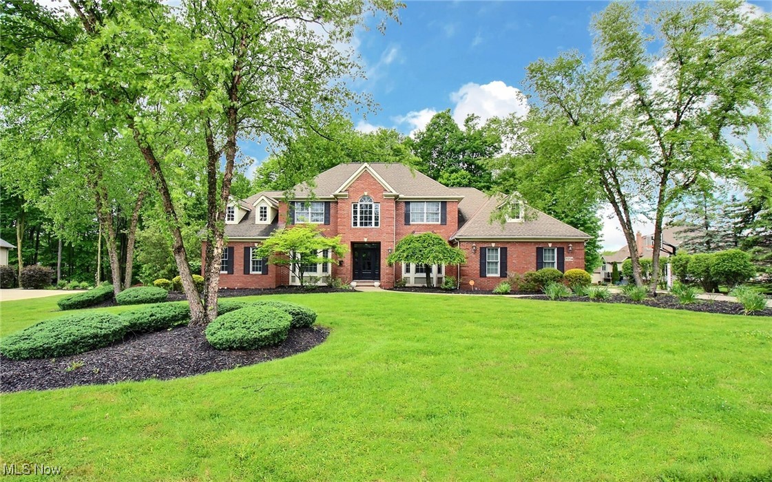 This all-brick colonial sits on nearly two acres in one of Brecksville’s most desirable neighborhoods and offers a layout that truly works for everyday living and entertaining alike. The main level features a spacious great room with custom built-ins and a fireplace, formal living and dining rooms, and a beautifully updated eat-in kitchen with plenty of storage and prep space. A bright breakfast area opens to a deck with peaceful wooded views. The first-floor primary suite includes two walk-in closets and a generous bath, plus there’s a private office with its own deck. Upstairs are three additional bedrooms and two full baths. The walk-out lower level adds serious square footage with a rec room, home theater, full bath, guest bedroom, and ample storage. The backyard offers a quiet, private setting and the attached three-car garage provides plenty of space. Great location minutes from I-77, within the highly rated Brecksville-Broadview Heights School District, and close to CVNP, ski resorts, golf, and the Brecksville community center. This is a fantastic opportunity in a prime location.