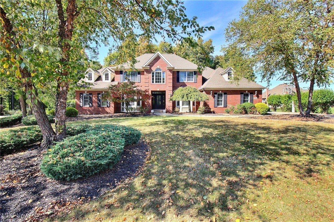 This all-brick colonial sits on nearly two acres in one of Brecksville’s most desirable neighborhoods and offers a layout that truly works for everyday living and entertaining alike. Freshly painted throughout the main level, the home features a spacious great room with custom built-ins and a fireplace, formal living and dining rooms, and a beautifully updated eat-in kitchen with plenty of storage and prep space. A bright breakfast area opens to a deck with peaceful wooded views. The first-floor primary suite includes two walk-in closets and a generous bath, plus there’s a private office with its own deck. Upstairs are three additional bedrooms and two full baths. The walk-out lower level adds serious square footage with a rec room, home theater, full bath, guest bedroom, and ample storage. The backyard offers a quiet, private setting and the attached three-car garage provides plenty of space. Great location minutes from I-77, within the highly rated Brecksville-Broadview Heights School District, and close to CVNP, ski resorts, golf, and the Brecksville community center. This is a fantastic opportunity in a prime location.