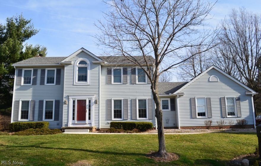 Wonderful and stately colonial on cul-de-sac boasts flowing floor plan and numerous updates throughout. New front walkway (June '16) leads to new front door/entrance and gracious foyer. Elegant formal dining with chair rail and crown molding. Inviting living room features pocket doors and opens to family room. Engaging family room offers full wall brick, gas fireplace and bay window. Chef's kitchen presents SS appliances, center island, planning station, peninsula breakfast bar, and separate eating area. Vaulted sunken sunroom with large picture window and sliders to patio offers panoramic views of wooded backyard. First floor laundry and half bath conveniently located. Master bedroom with glamour bath and WIC. Three generous sized bedrooms and main full bath complete the second floor. Lower level features family room with recessed lights, bdrm/multi-purpose rm, half bath, and storage area. 3 car garage. New carpet (June '16) on first and second floors. New patio (June '16). Additional