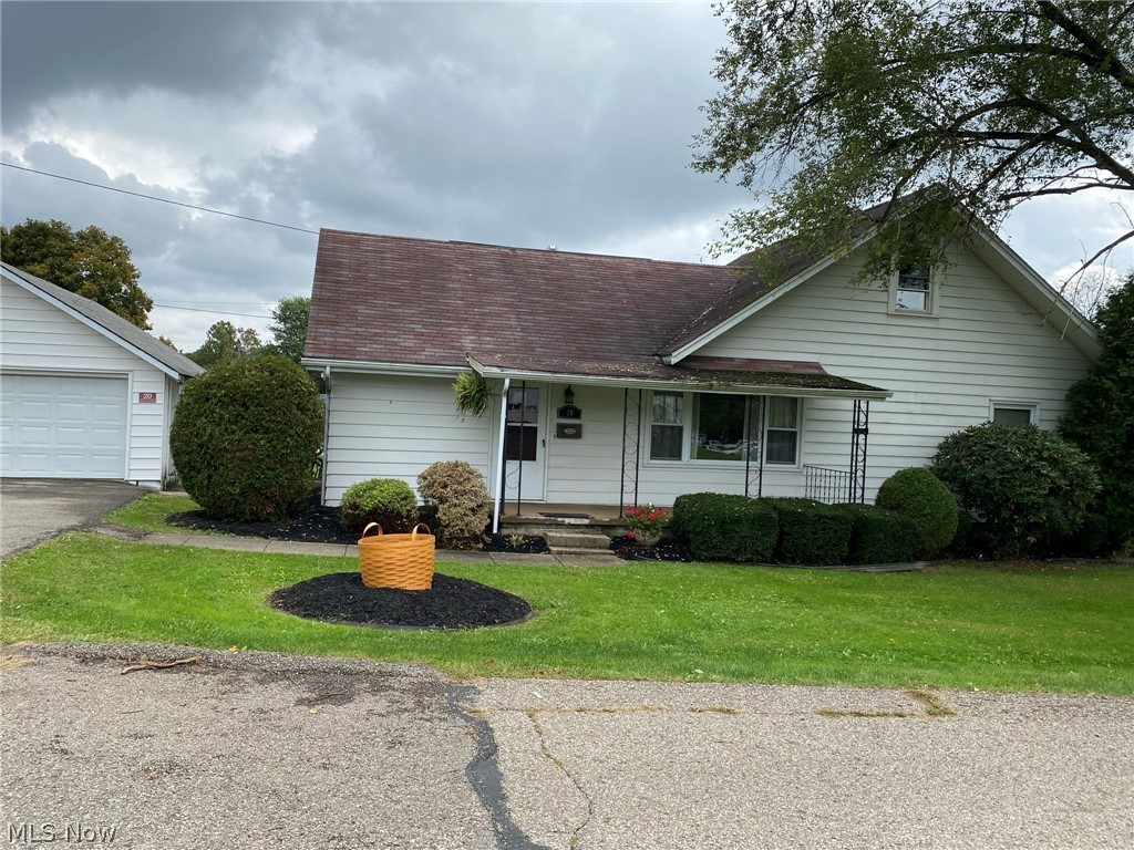 Adorable 3 bedroom bungalow in New Concord w/lots of character & charm! 6-car garages - 2 car garage next to house & additional 4 car garage in alley beside house. House has 1st floor laundry & 1st floor master & updated bath w/handicap shower. Extra bedroom upstairs covers the whole top floor, full basement w/family room & new high efficiency furnace. Formal living, dining room & cozy eat-in kitchen w/breakfast nook & extra half bath. Full basement has been waterproofed by Everdry - sump pump and warranty included. Large private corner lot in New Concord. John Glenn / East Muskingum School District.