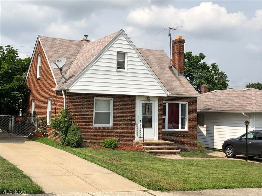 Solid brick bungalow with plenty to offer. Generously sized rooms with lots of nice features. Large living room with gleaming hardwood floors. Eat in kitchen with ample table space and comes with appliances. Two really nice sized bedrooms on the first level with gorgeous hardwood and laminate floors. The bath has had some recent updating with newer tub surround and fixtures. Nice tile flooring!  The second floor is huge with some many options you will need a checklist to see how to use it.  So many nooks and storage spots make this a great master suite or that teen retreat!  Many possible scenarios based on its size and layout.  The rec-room is also very large and inviting. A few finishing touches added to the old knotty pine paneling could make this quite the spot.  A fireplace sets the mood for fun and entertaining.  A second bathroom is a possibility as the toilet is already in.  The home at one time was waterproofed with an inside system with sump pump ensuring your belongs will be