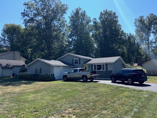 Absolutely gorgeous four level split on a half acre corner lot features three bedrooms, two full bass, kitchen with all appliances, very spacious family room with brick fireplace, basement and large deck off of dining room. UPDATES: roof, siding and downspouts 2021, high efficient, central air and furnace 2021, Kitchen 2022, vinyl windows 2008, carpeting 2021, New bathroom upstairs, 2019 and new and bathroom downstairs 2018, all new appliances 2020, very large shed 2018 and hot water tank 2018. Very tasteful fully decorated throughout with neutral colors. All the major components have been taken care of, all you need to do is move in! This can be shown on a short notice of five hours .