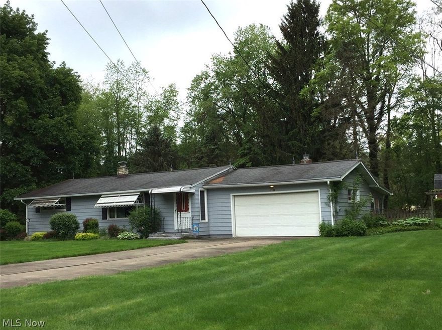 Solid, well-built home on private lot next to an apple orchard. Refinished kitchen, bright & cheerful living room, oversized eat-in kitchen, relaxing enclosed patio behind garage, and a spacious basement ready to be finished for more living space. Call today.