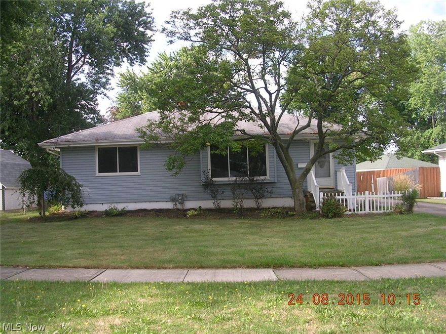 Fully updated 3 bedroom home ready to be yours. This house has vinyl siding and vinyl replacement windows! Gorgeous hardwood floors and the huge living room has tons of natural light (hardwood also under carpet in bedrooms). Brand new carpet in bedrooms and basement. Entire interior has been freshly painted including basement rec room. Kitchen has brand new cabinets/new counter top/new sink and faucet/new disposal/ new oven/new dishwasher and new microwave. Spacious updated bathroom has a nice size linen closet for extra storage. Full basement has glass block windows and a huge finished rec room with brand new carpet.  Fully fenced yard and large patio great for entertaining. Oversized 2 car garage has been freshly repainted 10/2015. Located on a quiet street yet minutes from interstate access, shopping, and tons of amenities. Great location!