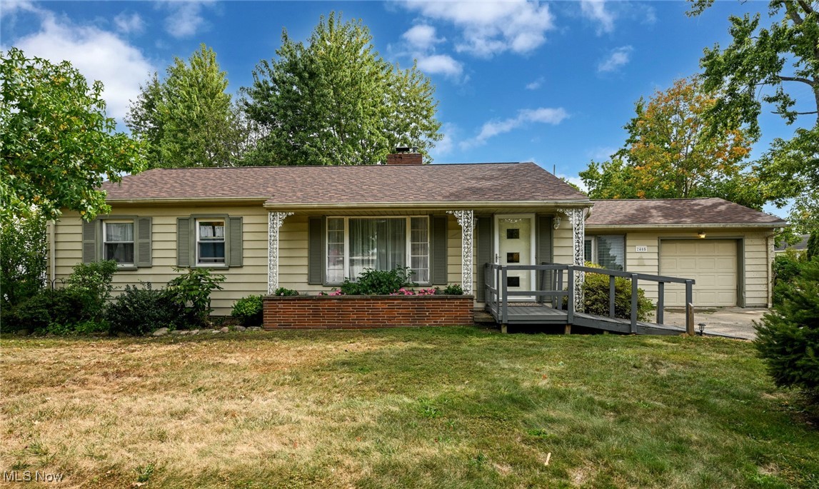Step into this updated 3-bedroom, 2-bath ranch home that blends charm with thoughtful improvements. From the moment you arrive, the inviting curb appeal sets the tone with mature landscaping, a classic brick planter, and decorative ironwork on the welcoming front porch. Inside, you’ll find hardwood floors throughout the spacious living room, anchored by a fireplace that creates a natural gathering space. The kitchen is bright and functional, featuring freshly painted cabinetry, updated hardware, and a patterned floor that adds a touch of personality. Just off the kitchen, an eat-in dining nook offers views of the backyard while providing extra space for storage or display. A cheerful enclosed sunroom expands the living area, giving you a versatile spot for casual dining, plants, or hobbies. On the main floor, three bedrooms are complemented by a full bath, while the lower level reveals a finished basement with an opulent drop ceiling and soft carpeting, presenting perfectly as a media or entertainment room. The basement also includes a second full bath, along with the flexibility to create an additional bedroom or office if desired. Outside, a true backyard retreat awaits your arrival. With low-maintenance stone and privacy from neighboring views, this outdoor area feels tucked away. A spacious deck extends your living space outdoors, offering room for dining, grilling, or simply relaxing under the trees. Recent updates bring peace of mind, including a complete roof tear-off and replacement in 2024. Other thoughtful upgrades throughout the home highlight the care and attention of the current owner. The attached garage and wide driveway add convenience, while mature shade trees and perennial plantings enhance the grounds of this endearing corner lot.
This home combines comfort, character, and modern improvements into a package that’s ready for its next chapter. Don’t miss the opportunity to make it yours. Schedule a showing and experience all that it has to offer!