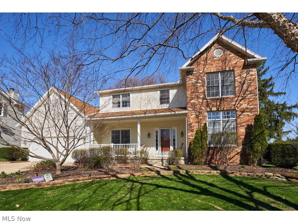 Charming 4 bed, 2.5 bath colonial on cul-de-sac close to Sand Run Park, Cuyahoga Valley National Park, and great shopping. Enjoy evenings from the lovely front porch. Wonderful for entertaining with open floor plan and 9-foot ceilings on the first floor. The kitchen features SS appliances and double oven, wine fridge, granite countertops, center island and hardwood floors. The family room has a gas fireplace and french doors to the living room. Convenient first floor laundry and office. Vaulted master suite with large walk in closet and master bathroom with h/h sinks, spacious tub, walk in shower and ceramic floor. Three additional bedrooms and updated full bath complete the second floor. Partially finished basement with recreation room. The kitchen slider opens to backyard with paved patio with gas line for your grill and storage shed. Recent updates include: New carpet throughout the first floor, stairs, upstairs hall, and master suite: March 2019, tankless hot water tank 2014,