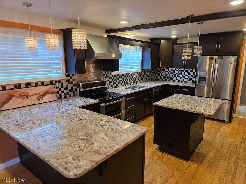 Photo of 5820 Wilson Mills Road, Highland Hills, OH 44143 (MLS # 5204443)