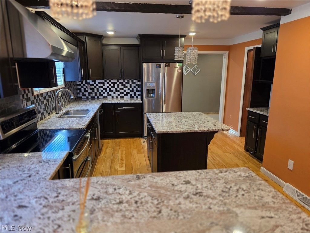 Photo of 5820 Wilson Mills Road, Highland Hills, OH 44143 (MLS # 5204443)