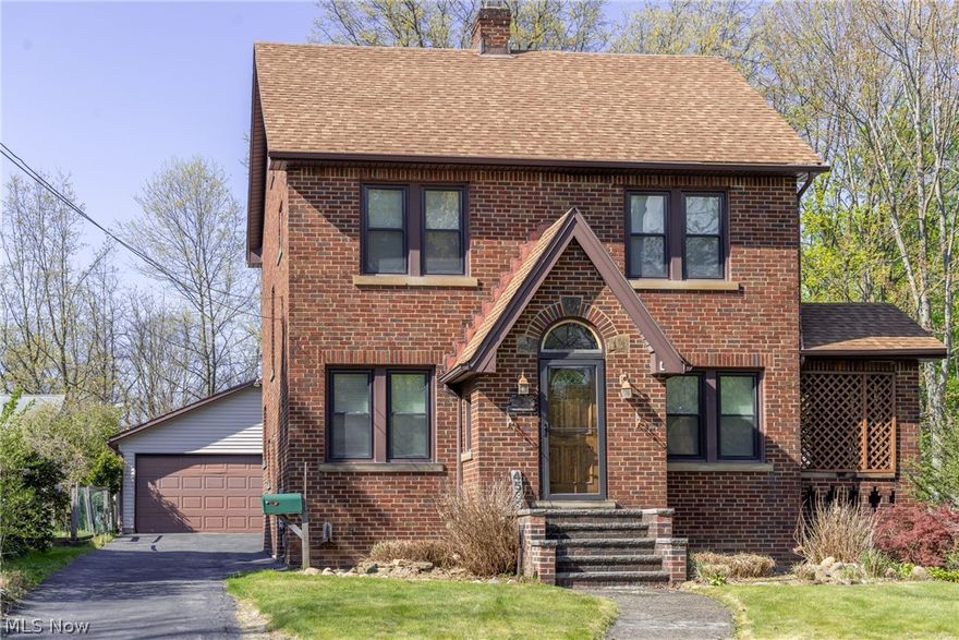 Welcome to this beautifully brick colonial situated on a private, fenced lot in the heart of South Euclid. Step inside to find a freshly painted interior complemented by brand-new flooring that flows seamlessly throughout the main level. The spacious living room features a cozy area that leads to a sunroom, offering a perfect, tranquil retreat. Entertaining is effortless with a formal dining room conveniently located just off the fully equipped kitchen, which includes all appliances. From the dining room, you can step right out onto the deck to enjoy outdoor meals and views of the private backyard. Upstairs, the second floor features freshly stained, gleaming hardwood floors across three generously sized bedrooms and a well-appointed full bathroom. Above, a huge attic provides exceptional space to meet all of your storage needs. The exterior is completed by an oversized two-car detached garage that provides ample parking and additional workspace. Perfectly positioned, this home is just moments away from local parks, shopping, schools, the library, and vibrant entertainment options. For a seamless transaction and added peace of mind, the property will be fully point-of-sale compliant prior to title transfer. Windows and the roof were replaced approximately within the last 10 years.