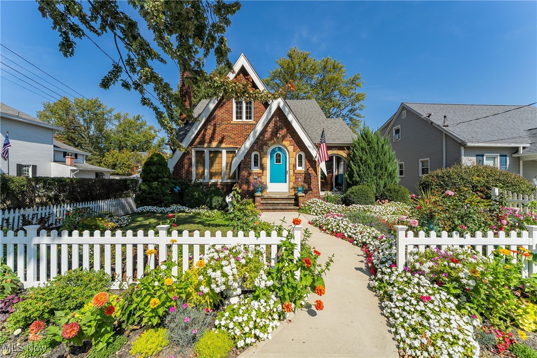 Welcome to 5572 South Street, a home that truly feels like it stepped out of the pages of a storybook. Nestled in Vermilion’s Historic District and just steps away from Main Street Beach, local cuisine, and charming boutiques. This beautifully decorated residence captures the warmth of its original character while offering thoughtful modern upgrades. With 1,618 sq. ft., this home features 3 spacious bedrooms and 1.5 baths, including a convenient main-level bedroom and full bath. The layout is both inviting and functional, showcasing a cozy fireplace in the living room, a formal dining room, and an eat-in kitchen with new countertops, backsplash, and appliances. Relax in the cheerful coffee and sunroom, or step upstairs to enjoy the balcony overlooking Harbourtown Fine Arts. The charm extends outdoors with storybook cottage landscaping, a private patio, and a two-car garage with oversized parking pad. Recent improvements include basement and balcony waterproofing, newly poured concrete front and side entries, new mini split heating and air conditioning units in the family room and each bedroom. This home is being sold fully furnished, down to the flatware! Every detail has been thoughtfully curated, from luxury furniture and rugs, high quality bedding, artwork, and décor - offering a true turn-key experience. Currently a successful Airbnb, this property is equally ideal as a primary residence, vacation home, or investment. Whether you’re sipping coffee in the sunroom, enjoying cozy evenings by the fireplace, or entertaining guests on the patio, this home offers a lifestyle as enchanting as its storybook design.