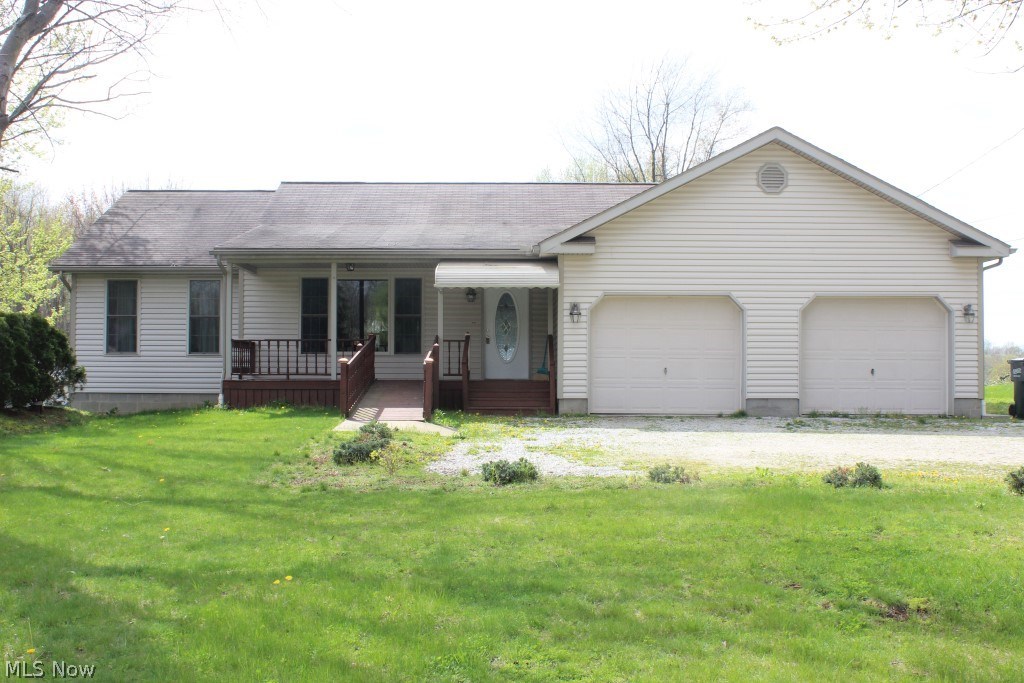 Spacious 2 bedroom, 2 bath ranch on 1.48 acres on dead end street & handicap accessible* Built 1998 with 1386SF* Open floor plan* Dining room with access to 15x8 covered deck* Kitchen with island, breakfast bar, dishwasher, disposal, burner top & built in oven* Split bedroom arrangement* Master bedroom with master bath and walk in closet* Guest bedroom & guest bath* 1st floor laundry* 12 course walk out unfinished basement with private access from garage, glass block windows, 3 large windows, plumbed for bath- many possibilities* Covered front porch* Attached 2 car garage (divided -can be private bays)* Quiet tranquil setting*