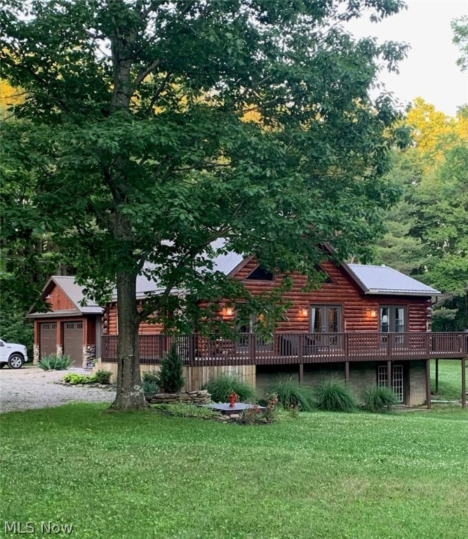 This well maintained 3 bed/2bath log home situated on 3.2 acres is beckoning for you to come enjoy all the peaceful serenity this property has to offer! With many updates throughout including flooring, new ac/furnace, backup generator system & tiled shower this house is ready to move into! The log exterior has been meticulously maintained by professionals. The open loft adds lots of additional finished space upstairs while the unfinished basement offers lots of room for storage with easy outside access. The property has plenty of room for a garden, fire pits and even a wooded area to enjoy the rich population of wildlife. Rural water is coming through to this property in the very near future and the tap has already been paid for by the seller. Call today to setup your showing of this country treasure!