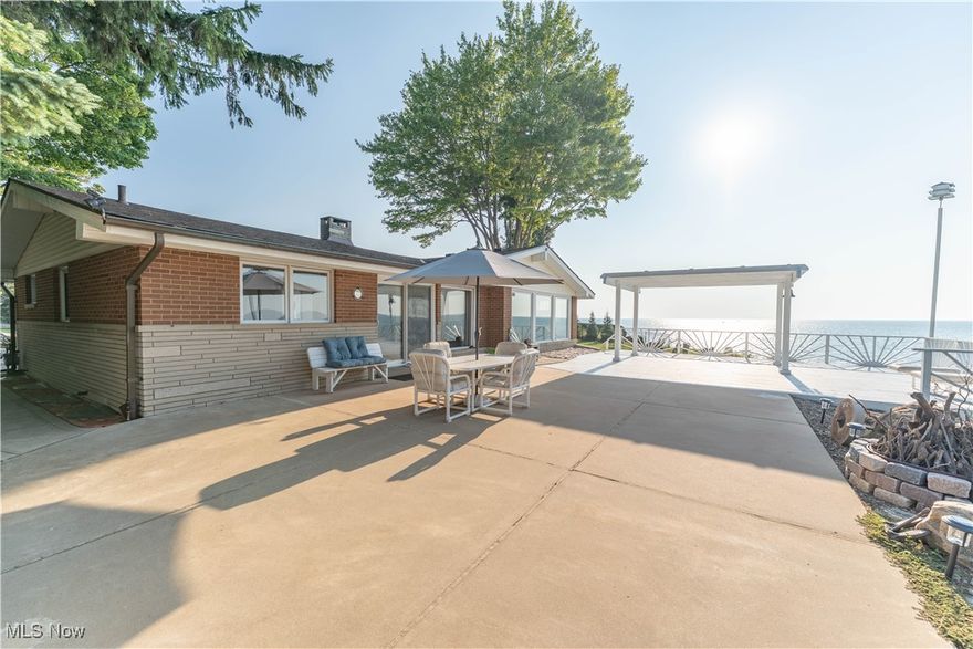 Get ready to experience breathtaking 180° Lake Erie sunsets right from your own expansive deck and through a dramatic wall of windows in the living room. This well-maintained 3 Bedroom, 2.5 Bath Ranch offers over 1,900 sq. ft. of one-floor living with a perfect blend of charm and comfort. The spacious kitchen, complete with all appliances, ceramic flooring, abundant cabinetry, and generous counter space, flows seamlessly into the dining area and large living room featuring original hardwood floors, a cozy gas fireplace, and panoramic views of the lake.
The primary suite includes an attached full bath, while the lower level offers a true extension of living space with a massive 50x23 recreation room, tile flooring, glass block windows, a half bath, and a versatile bonus room—ideal as an office or easily converted into a 25x16 additional bedroom. Recent Updates: Furnace (3 years), HWT (new), Roof (6 years), Ac (3 years). 
This home is perfectly positioned back from the street with multiple outdoor entertaining areas, including a front sandstone patio, spacious back deck right up to the Lake and concrete patio overlooking the water. With just a bit of clearing, enjoy direct access to the lake for swimming, kayaking, or simply soaking in the shoreline.
This is more than a home—it’s a front-row seat to lakefront living. Don’t miss your opportunity to own a piece of paradise on Lake Erie!
