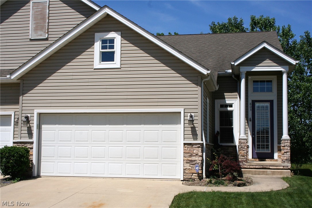 No need to sacrifice living or storage space in this lovely 2352 sq ft Grey Hawk Golf Community town-home. The moment you enter you will notice the difference between custom and cookie cutter! Open foyer, cathedral ceilings, first floor owners suite, first floor laundry room and an amazing open floor plan!  The kitchen is the heart of this home. It boasts ceramic tile flooring, under cabinet lighting, tons of cabinets and countertop space, a large pantry and a bonus closet. There is a breakfast bar and dining area which separates the kitchen and the great room with a cozy gas burning fireplace.  8 foot sliding doors lead to a back patio that overlooks a small wooded area and green space that provides nice privacy. 2 other bedrooms on the second floor, a recently remodeled guest bath and a flex loft area that has so many possibilities (play room, work out area, home office etc..) The amount of storage in this home is so accommodating that you may tend to forget that there is also an en