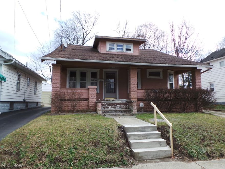 Master bungalow with four bedrooms.  Huge master suite on 2nd floor. 1st floor den.  Hardwood floors in many rooms. Full front porch.  Nice investment or for the handyman homeowner.  Property sold AS IS.  Equal housing opportunity.  FHA insurable w/escrow per HUD appraisal.
