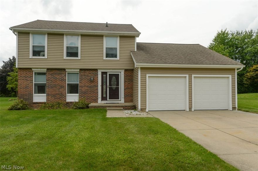 Move in Ready Colonial located in the desirable Partridge Highland developement in Stow Ohio. Nice open new kitchen comes with appliances. The open floor plan incorporates the kitchen,  dining room and living room. The large 22 x 26 back deck can be accessed from the living room, kitchen area. The yard is a good size and semi private. If you look at the drone pictures you will see this home sits on a nice lot with woods behind the home. There is also a 14 x 22 recroom in the basement. The updates include a Roof 2009, New hotwater tank, New kitchen, Siding in 2013, Concrete driveway in 2008 and newer appliances. This home is move in ready and immediate possession is available. Call for your private showing today.