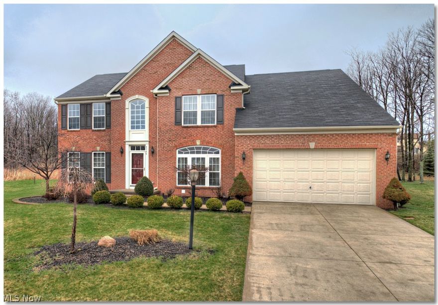 Brick Front Colonial On Cul-De-Sac. Over 3500 Square Feet. Only 6 Years Young. Why Build? Move In and Enjoy! Loads Of Upgrades Including Granite Counters, Hardwood Flooring, Extra 4' Extension Up & Down, Adding More Space To Master Bedroom and Family Room. Master Bath With Whirlpool & Corian Counter. 3 Additional Bedrooms With 2 Full Baths Up. Main Level With Formal Living Room, Dining Room, Den & Family Room With Fireplace. Kitchen With Morning Room, Breakfast Bar, Top Of The Line Appliances & Hardwood Flooring. Additional Features Include Sprinkler System, Zoned Heating, Stamped Concrete Patio, Brick Front, Whirlpool Tub In Master. Full Basement Plumbed For Full Bath. Pride Of Ownership. This Is Not Bank Owned Or A Short Sale.