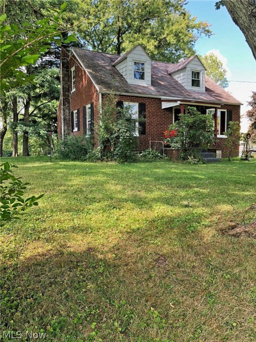 5 acre hobby farm! Nice fenced in area for livestock with barn and chicken coop. Large 2 car garage for car enthusiasts has electric, running water and potential heat source. Home has been gently used. Finished walkout lower has newer flooring and fresh paint throughout. Very well maintained with lots of potential. Centered between Alliance and Minerva!