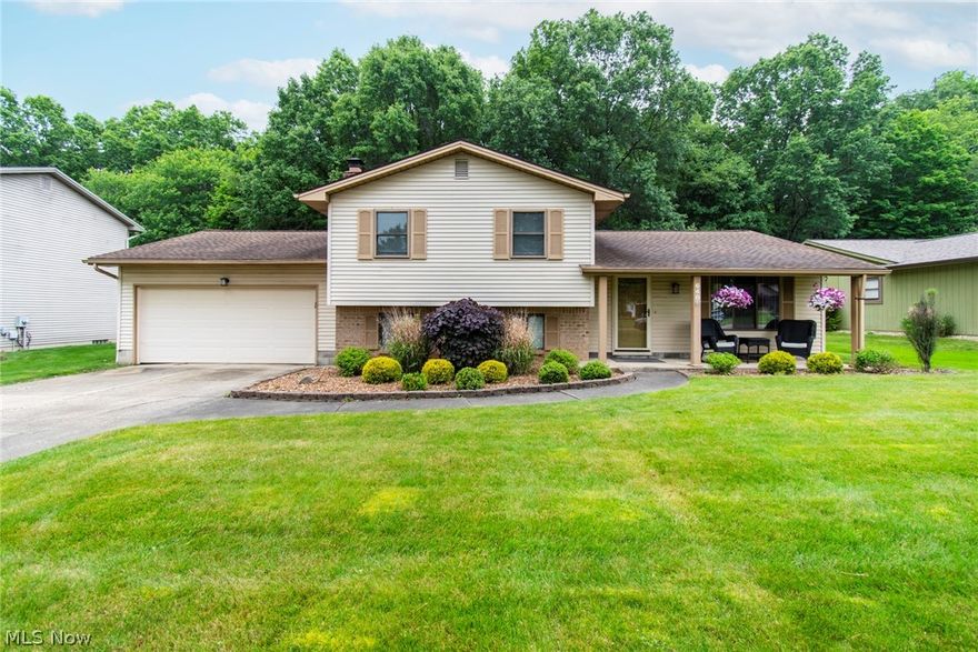 Well maintained 3 level split bordering Mill Creek Park!  Tons of privacy!  Newer roof & sump pump. Kitchen counters are newer and all appliances are within 2 yrs old. Remodeled full bath off of family room. Wood burning fireplace. Shed is 16 x 20 with loft and electric.  Beautiful patio out back overlooking the private backyard. Attic access with tons of storage.