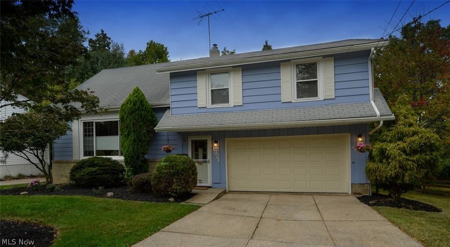 Beautifully updated split level home located on a serene, parklike wooded lot.  Enjoy the peaceful music of the gently flowing creek from the comfort of the upper level deck or lower level patio. Recent updates in 2017 include interior paint thruout, Siemens electrical panel installed including exterior service inlet & weatherhead; carpet installed on stairs and both bedroom levels; vinyl plank flooring installed in entry hall, bathroom, living & dining rooms as well as kitchen; kitchen cabinetry, backsplash, counter tops, range hood, pantry doors, flooring & window;  much, much more! Lots of living space between the eat-in kitchen, dining room, living room and lower level family room and small private office.  With four bedrooms, two full baths remodeled with new window & added insulation in 2011, newer windows in 1997, living room window in 2013, vinyl siding in 1998...everything has been done for you! Easy distance from award winning schools and public library, parks and recreation,