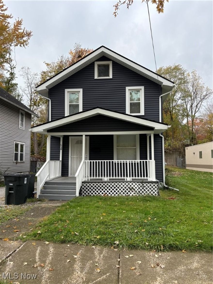 Welcome to 634 Spicer St! This 3 bedroom 1 bathroom home is completely renovated. It features a traditional living room and dining room along with an eat in kitchen. Kitchen features stainless steel appliances, new cabinetry and countertops. There are three spacious bedrooms upstairs with a full bathroom that features granite sink countertop, deep soaking tub and new fixtures. Freshly painted and vinyl flooring throughout home. There are newer windows, updated electrical panel, along with well maintained hot water tank and furnace. The exterior features new vinyl siding, new roof and spacious front porch. Just minutes away from the University of Akron, downtown Akron, eateries, and more. Call today for your private showing!