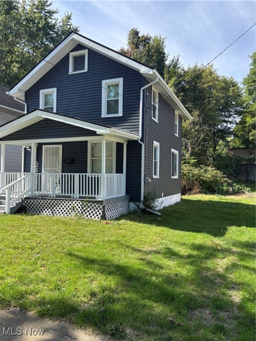 Welcome to 634 Spicer St! This 3 bedroom 1 bathroom home is completely renovated. It features a traditional living room and dining room along with an eat in kitchen. Kitchen features stainless steel appliances, new cabinetry and countertops. There are three spacious bedrooms upstairs with a full bathroom that features granite sink countertop, deep soaking tub and new fixtures. Freshly painted and vinyl flooring throughout home. There are newer windows, updated electrical panel, along with well maintained hot water tank and furnace. The exterior features new vinyl siding, new roof and spacious front porch. Just minutes away from the University of Akron, downtown Akron, eateries, and more. Call today for your private showing!