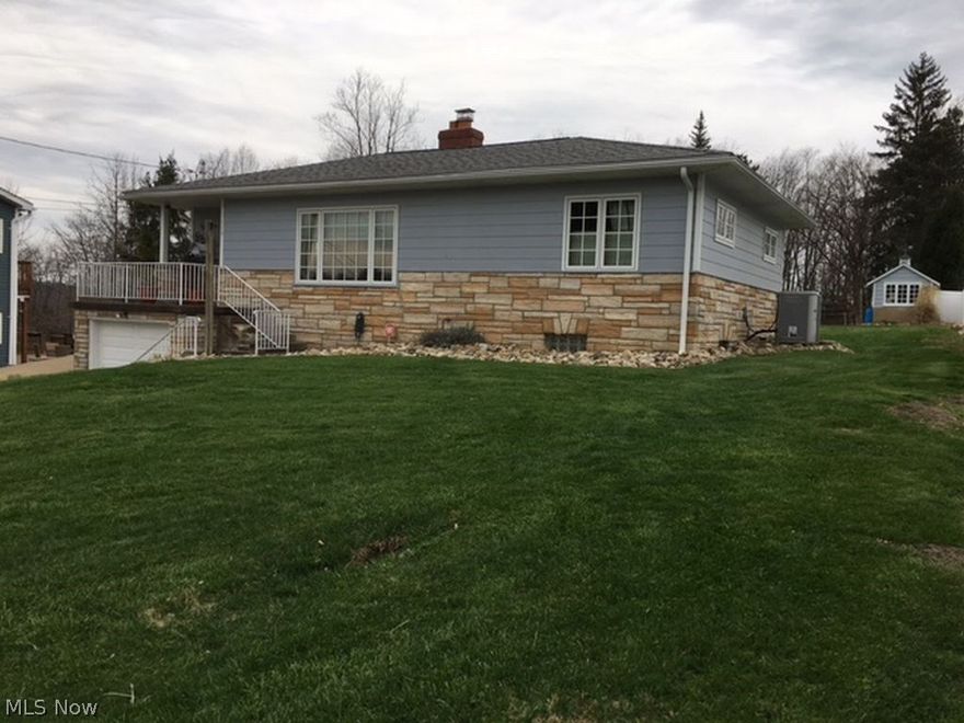 Warwood- Clearview- This home has it all. Pristine condition, breathtaking view, super location, and entire updates and remodeling have been done throughout the house. This property offers a 3 bedroom ranch located on approximately 1.2 acres which is all usable and overlooks the Ohio Valley. The lower level has a brand new family room, full high end bath, exercise room, and laundry with a one car attached garage and workshop area. Enjoy the living room with a gas fireplace with a view of the hills of WV and the back of the ranch is so inviting for gatherings while the very large back yard can accommodate any type of social event. Also on the property is a 2 car detached garage and a shed for additional storage. Another plot of land fenced off for either a garden or animals of your choice. So many possibilities for the  ample amount of level land. this home is a turn key property which is waiting for an owner to call it HOME!