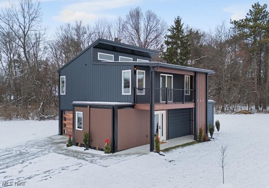 Welcome to this newly constructed modern home, designed with exceptional craftsmanship, high efficiency, and elevated style throughout. The exterior makes a bold impression with its striking black finish and contemporary wood garage door, setting the tone for the thoughtful design inside. As you step onto the covered front porch and enter the home, you are welcomed by a well-planned main floor that includes a comfortable living room, a stylish kitchen, a bedroom, and a full bathroom. This level also features a convenient laundry room, a space-saving dishwasher, and direct access to the one-car garage. The home is built with energy efficiency in mind, featuring spray foam insulation and SIP (Structural Insulated Panel) construction for superior temperature control and reduced energy costs. Split units provide efficient heating and air conditioning throughout, ensuring year-round comfort. Moving upstairs, you’ll notice the custom-built storage drawers integrated into the staircase—an innovative feature that adds both function and character. The upper level opens into a large multi-purpose space that can serve as an additional bedroom, home office, or flexible living area. This space is already plumbed for an optional extra bathroom, offering even more potential for customization. Additional storage is also available on this floor. Overall, this home blends modern design, smart energy-efficient upgrades, and versatile living spaces, creating a property that is both stylish and incredibly functional.